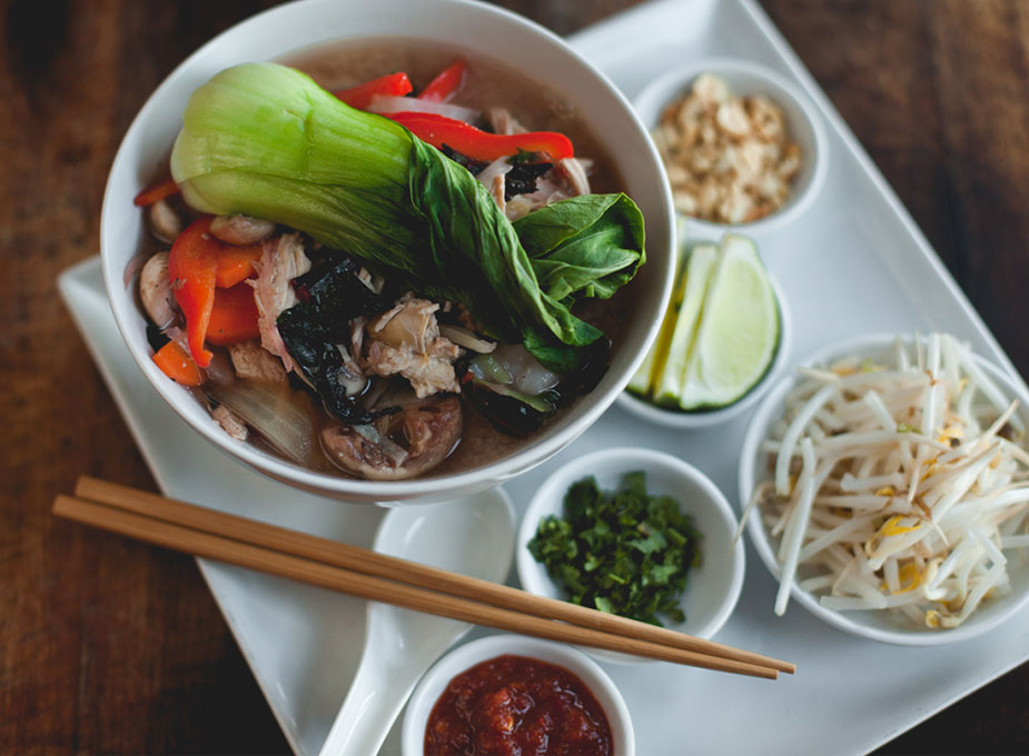 Bentwood Tavern Sushi Thursdays - Noodle Bowl beef and pork noodle bowl topped with bok choy and surrounded by traditional garnishes