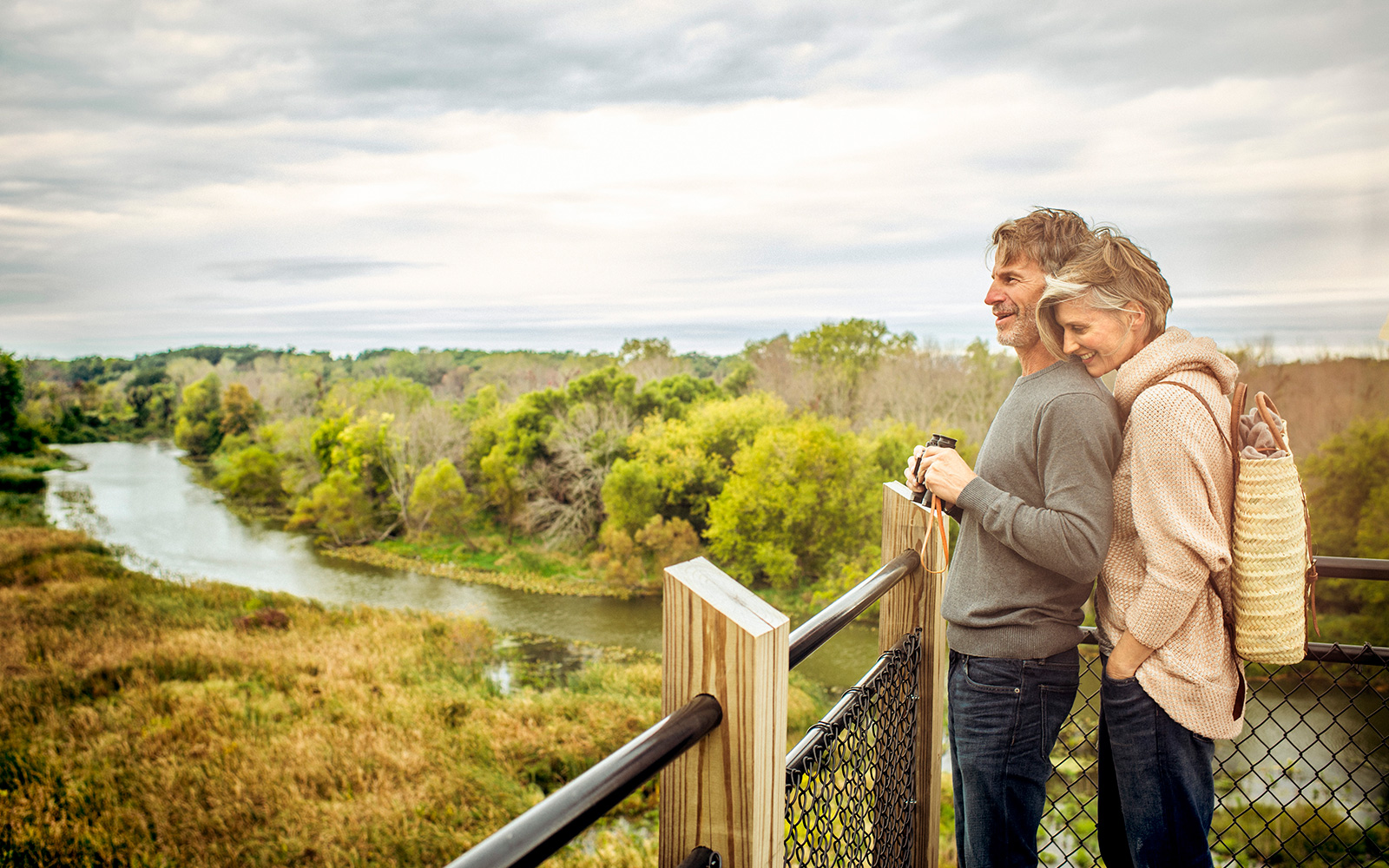 A romantic couple looking over the Galien river
