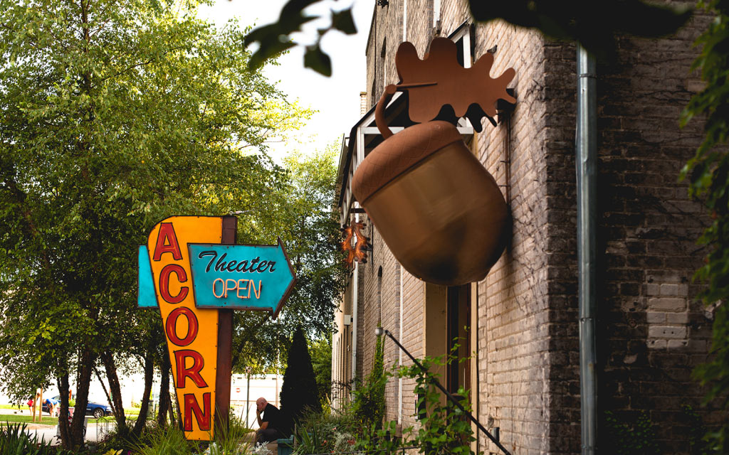 Acorn Theatre Sign and Large Acorn The Acorn Theatre sign and large acorn attached to building outside the entrance in New Buffalo, MI