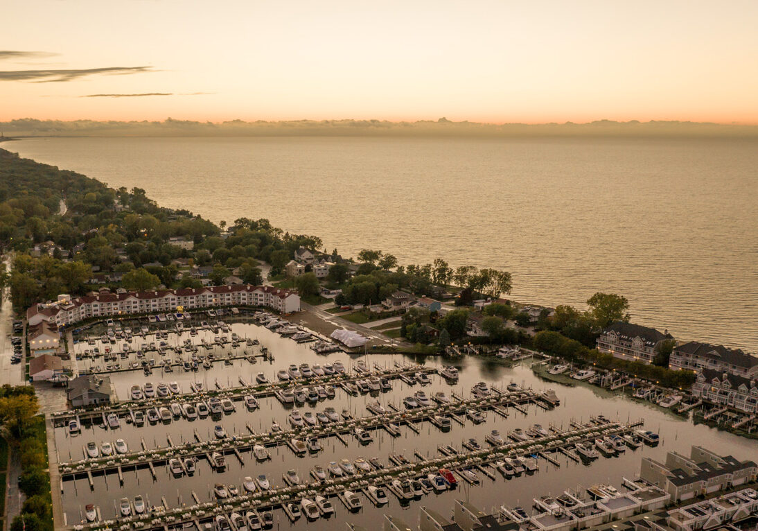 view from above of marina with boats and Lake Michigan