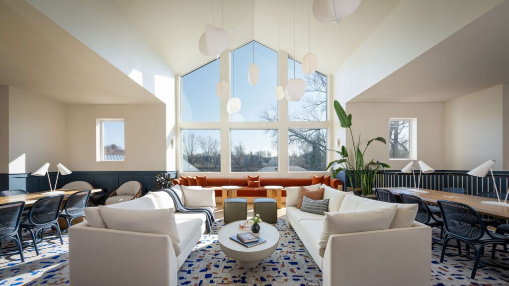 Spacious sunlit Mezzanine lounge area at the Marina Grand Resort in New Buffalo, Michigan.